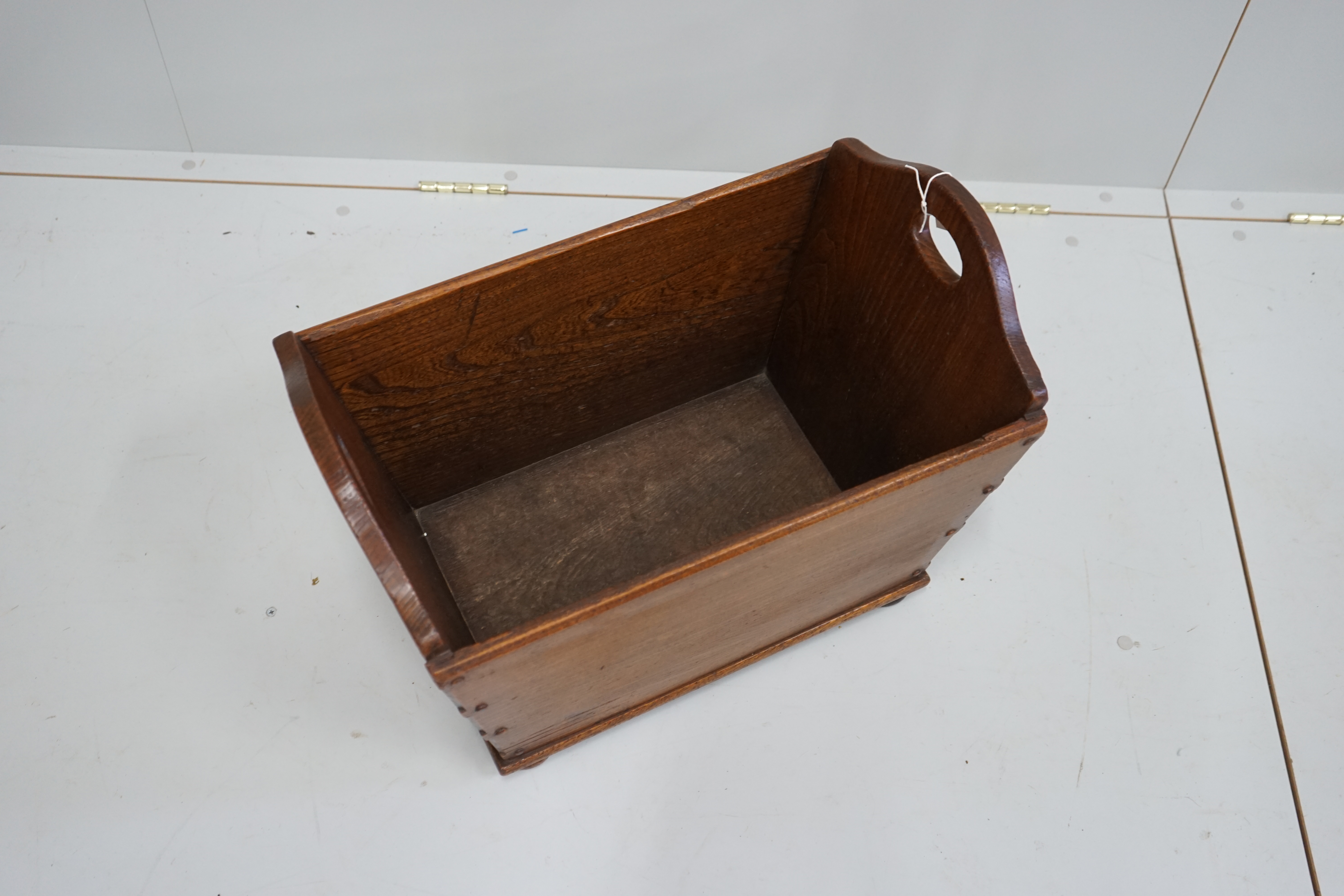A Russian moulded red acrylic mantel timepiece, width 19cm, and a Secessionist style beech cased timepiece